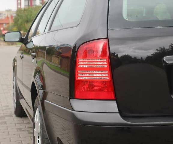 Черный Шкода Октавия, объемом двигателя 1.6 л и пробегом 200 тыс. км за 5400 $, фото 12 на Automoto.ua