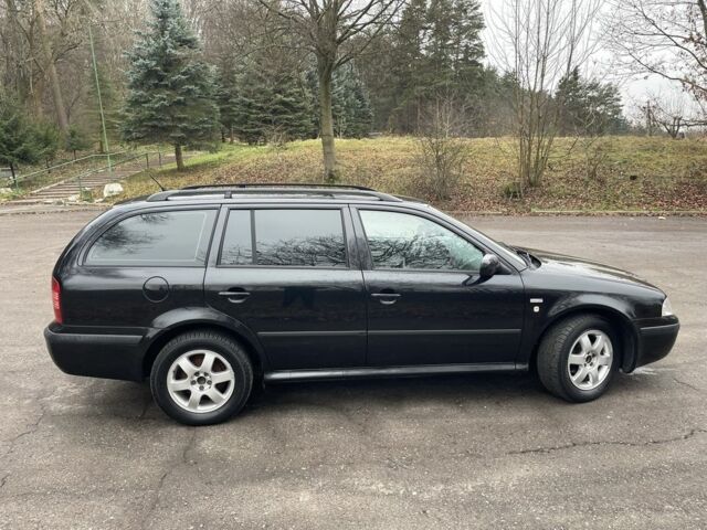 Черный Шкода Октавия, объемом двигателя 1.6 л и пробегом 217 тыс. км за 4599 $, фото 2 на Automoto.ua