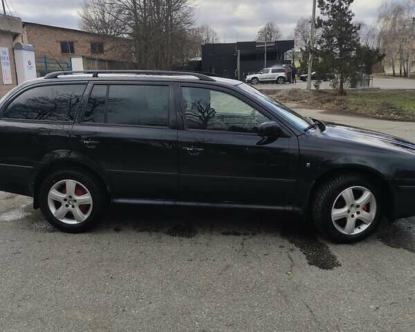 Черный Шкода Октавия, объемом двигателя 1.6 л и пробегом 255 тыс. км за 5300 $, фото 4 на Automoto.ua