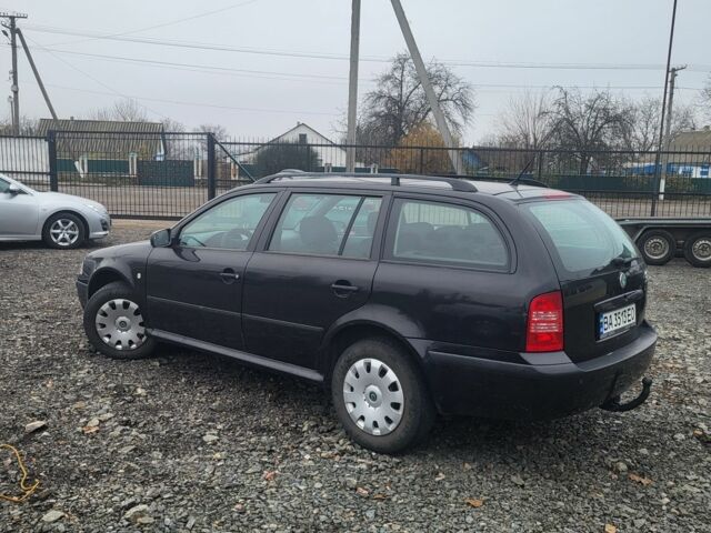 Черный Шкода Октавия, объемом двигателя 1.6 л и пробегом 155 тыс. км за 4450 $, фото 2 на Automoto.ua