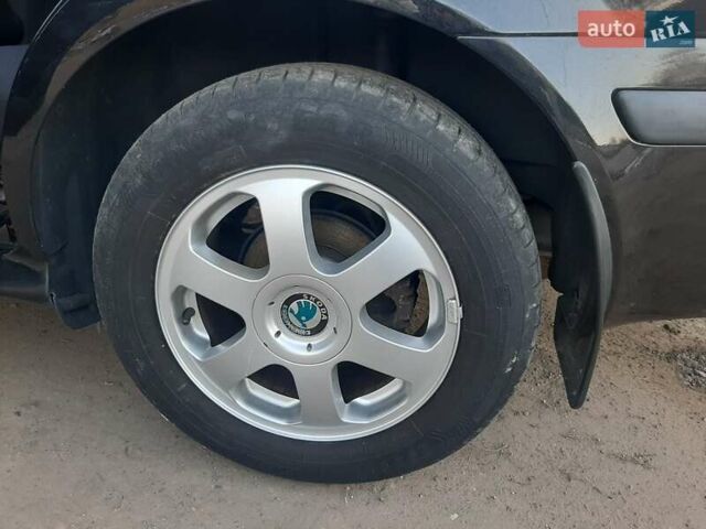Черный Шкода Октавия, объемом двигателя 1.78 л и пробегом 223 тыс. км за 5500 $, фото 109 на Automoto.ua