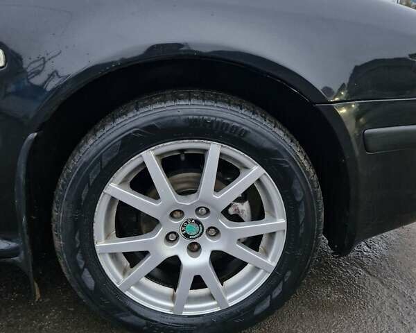 Чорний Шкода Октавія, об'ємом двигуна 1.6 л та пробігом 275 тис. км за 4650 $, фото 16 на Automoto.ua