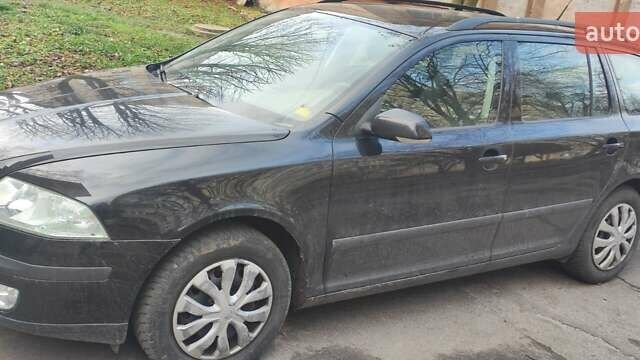 Черный Шкода Октавия, объемом двигателя 1.6 л и пробегом 235 тыс. км за 5400 $, фото 1 на Automoto.ua