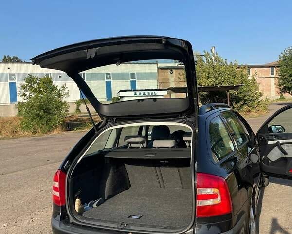 Черный Шкода Октавия, объемом двигателя 1.6 л и пробегом 268 тыс. км за 5700 $, фото 4 на Automoto.ua