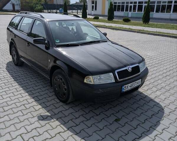 Черный Шкода Октавия, объемом двигателя 1.6 л и пробегом 257 тыс. км за 4100 $, фото 5 на Automoto.ua
