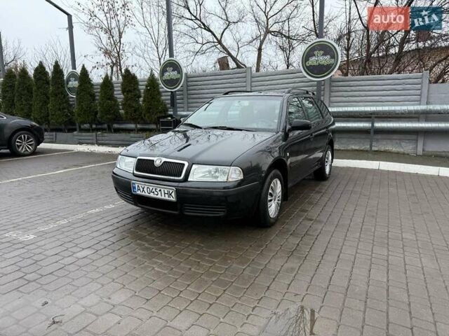Черный Шкода Октавия, объемом двигателя 1.6 л и пробегом 261 тыс. км за 5700 $, фото 2 на Automoto.ua