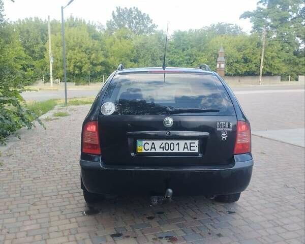 Черный Шкода Октавия, объемом двигателя 1.6 л и пробегом 288 тыс. км за 4500 $, фото 6 на Automoto.ua