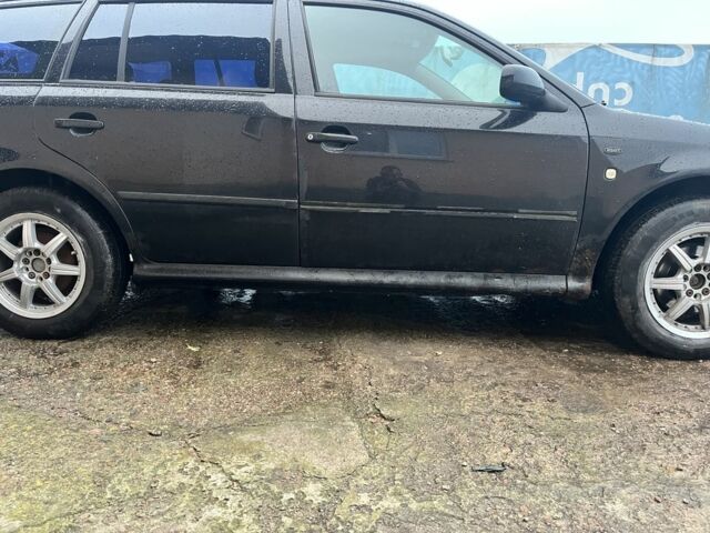 Черный Шкода Октавия, объемом двигателя 1.9 л и пробегом 30 тыс. км за 2376 $, фото 6 на Automoto.ua