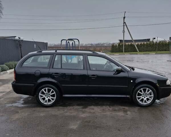 Чорний Шкода Октавія, об'ємом двигуна 1.6 л та пробігом 275 тис. км за 4650 $, фото 12 на Automoto.ua