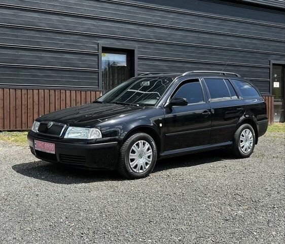 Черный Шкода Октавия, объемом двигателя 1.6 л и пробегом 205 тыс. км за 4950 $, фото 7 на Automoto.ua
