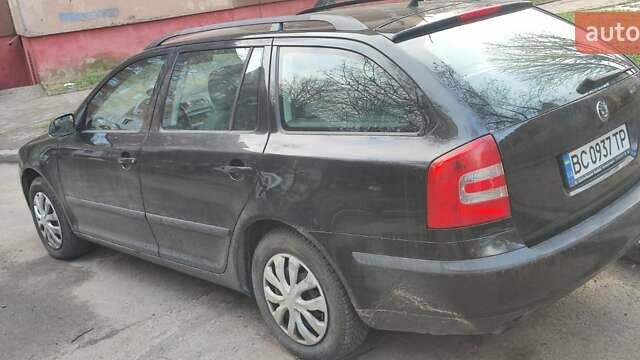 Черный Шкода Октавия, объемом двигателя 1.6 л и пробегом 235 тыс. км за 5400 $, фото 2 на Automoto.ua