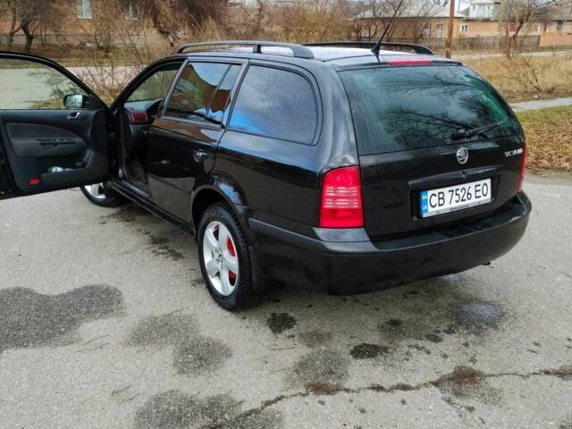 Черный Шкода Октавия, объемом двигателя 1.6 л и пробегом 255 тыс. км за 5500 $, фото 1 на Automoto.ua