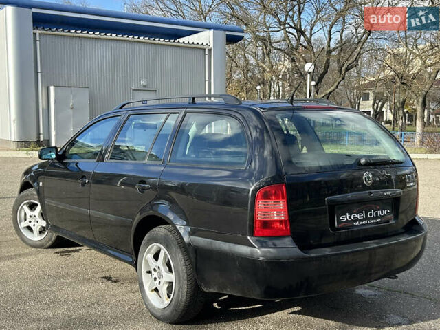 Чорний Шкода Октавія, об'ємом двигуна 1.6 л та пробігом 274 тис. км за 4699 $, фото 6 на Automoto.ua