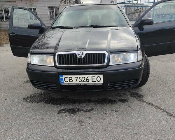 Черный Шкода Октавия, объемом двигателя 1.6 л и пробегом 255 тыс. км за 5300 $, фото 5 на Automoto.ua