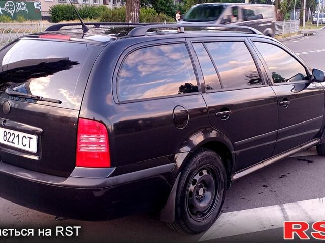 Черный Шкода Октавия, объемом двигателя 1.6 л и пробегом 200 тыс. км за 6000 $, фото 2 на Automoto.ua