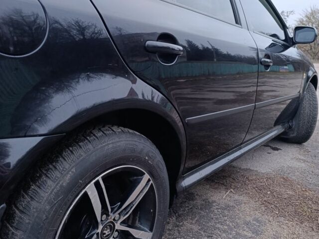 Черный Шкода Октавия, объемом двигателя 1 л и пробегом 256 тыс. км за 5300 $, фото 4 на Automoto.ua