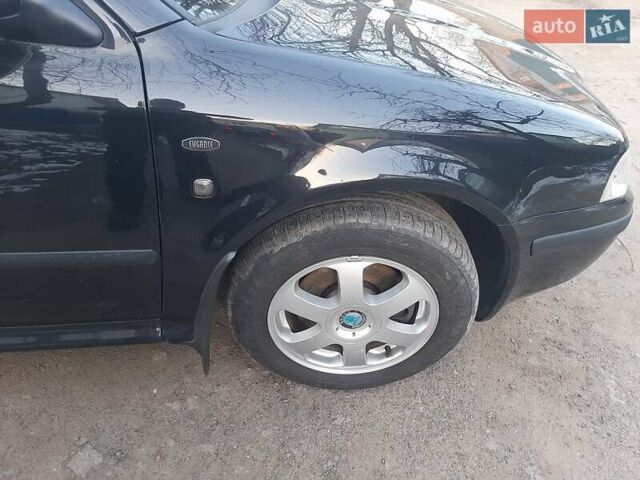 Черный Шкода Октавия, объемом двигателя 1.78 л и пробегом 223 тыс. км за 5500 $, фото 78 на Automoto.ua
