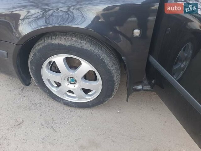 Черный Шкода Октавия, объемом двигателя 1.78 л и пробегом 223 тыс. км за 5500 $, фото 108 на Automoto.ua