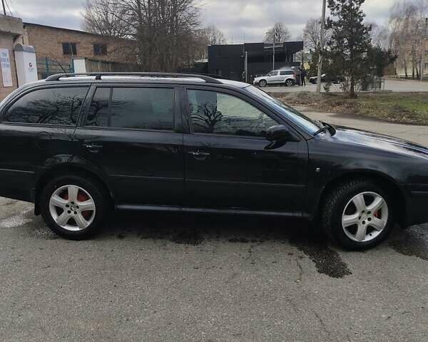 Черный Шкода Октавия, объемом двигателя 1.6 л и пробегом 255 тыс. км за 5500 $, фото 5 на Automoto.ua