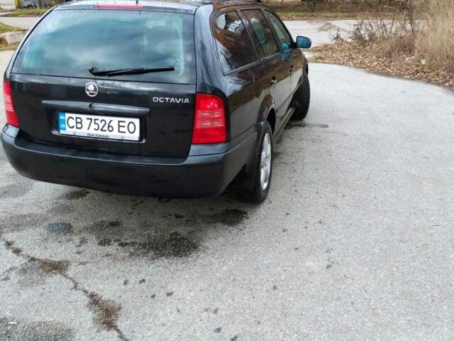 Черный Шкода Октавия, объемом двигателя 1.6 л и пробегом 255 тыс. км за 5500 $, фото 2 на Automoto.ua