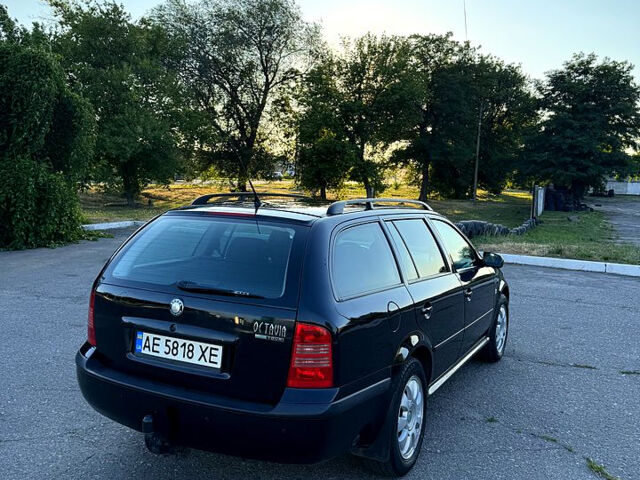 Черный Шкода Октавия, объемом двигателя 1.6 л и пробегом 297 тыс. км за 5500 $, фото 7 на Automoto.ua