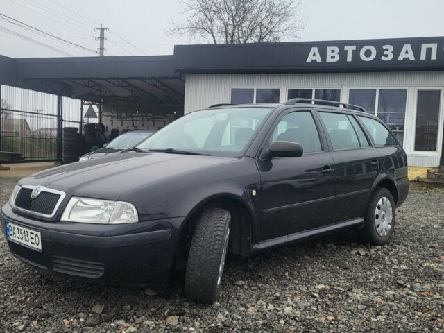 Черный Шкода Октавия, объемом двигателя 1.6 л и пробегом 155 тыс. км за 4450 $, фото 3 на Automoto.ua