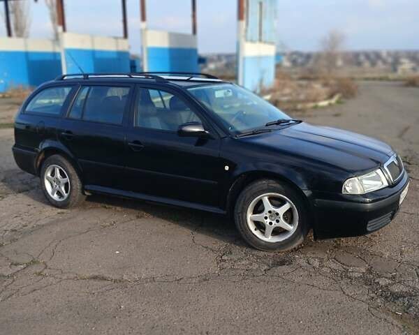 Черный Шкода Октавия, объемом двигателя 1.6 л и пробегом 274 тыс. км за 4250 $, фото 7 на Automoto.ua