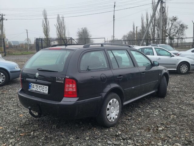 Черный Шкода Октавия, объемом двигателя 1.6 л и пробегом 155 тыс. км за 4450 $, фото 1 на Automoto.ua