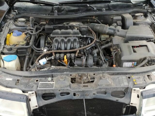 Черный Шкода Октавия, объемом двигателя 1.6 л и пробегом 255 тыс. км за 5500 $, фото 5 на Automoto.ua