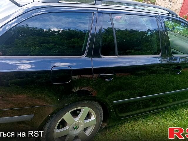 Черный Шкода Октавия, объемом двигателя 2 л и пробегом 260 тыс. км за 6000 $, фото 3 на Automoto.ua