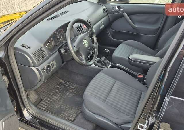 Черный Шкода Октавия, объемом двигателя 1.6 л и пробегом 217 тыс. км за 5700 $, фото 19 на Automoto.ua