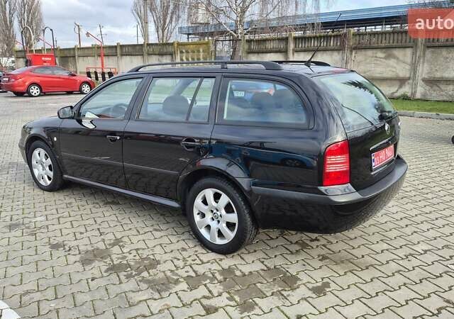 Черный Шкода Октавия, объемом двигателя 1.6 л и пробегом 217 тыс. км за 5700 $, фото 9 на Automoto.ua