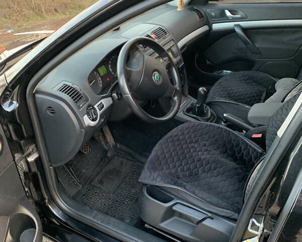 Черный Шкода Октавия, объемом двигателя 1.6 л и пробегом 265 тыс. км за 6450 $, фото 8 на Automoto.ua