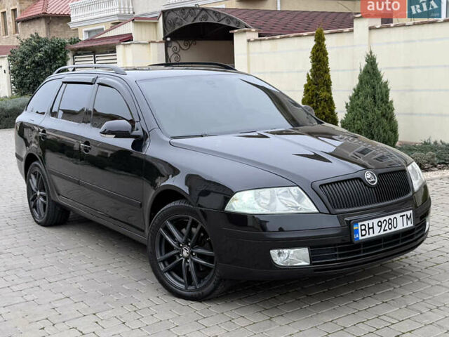 Чорний Шкода Октавія, об'ємом двигуна 2 л та пробігом 197 тис. км за 7400 $, фото 6 на Automoto.ua