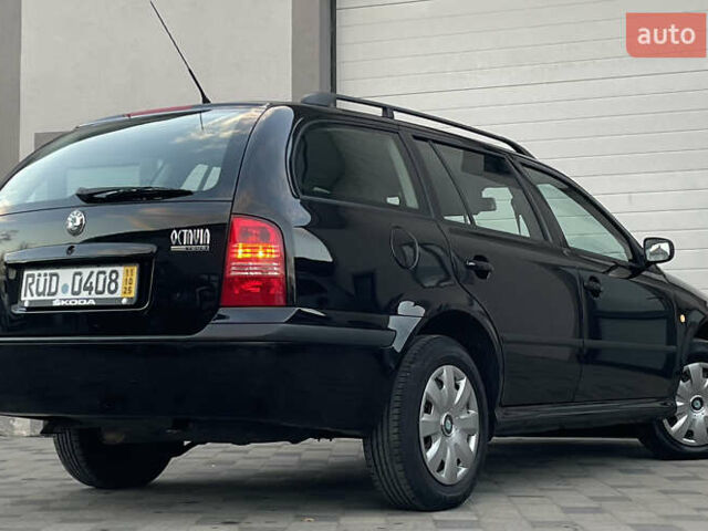 Черный Шкода Октавия, объемом двигателя 1.6 л и пробегом 169 тыс. км за 5850 $, фото 24 на Automoto.ua
