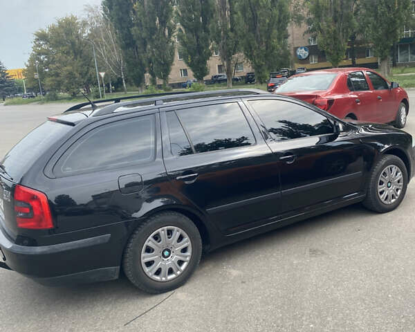 Черный Шкода Октавия, объемом двигателя 1.6 л и пробегом 211 тыс. км за 6999 $, фото 5 на Automoto.ua