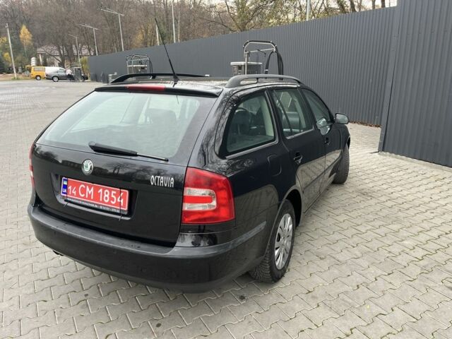 Черный Шкода Октавия, объемом двигателя 2 л и пробегом 184 тыс. км за 6250 $, фото 4 на Automoto.ua