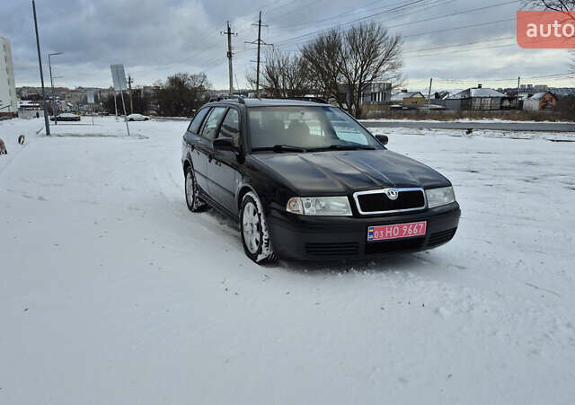 Черный Шкода Октавия, объемом двигателя 1.6 л и пробегом 217 тыс. км за 5800 $, фото 2 на Automoto.ua