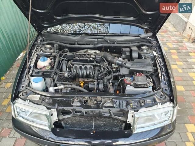 Черный Шкода Октавия, объемом двигателя 1.6 л и пробегом 158 тыс. км за 5200 $, фото 6 на Automoto.ua