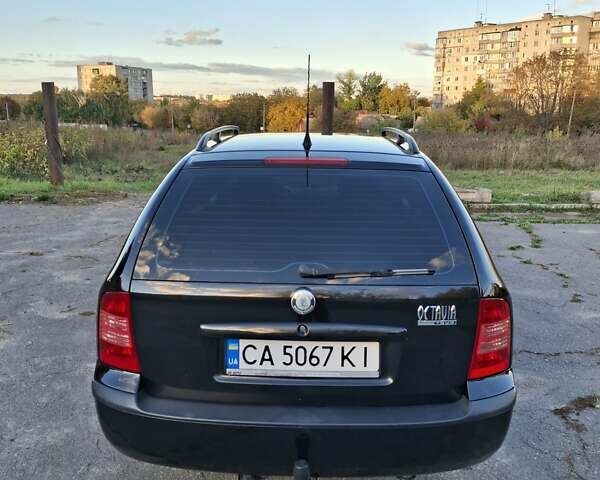 Черный Шкода Октавия, объемом двигателя 1.6 л и пробегом 261 тыс. км за 6300 $, фото 7 на Automoto.ua