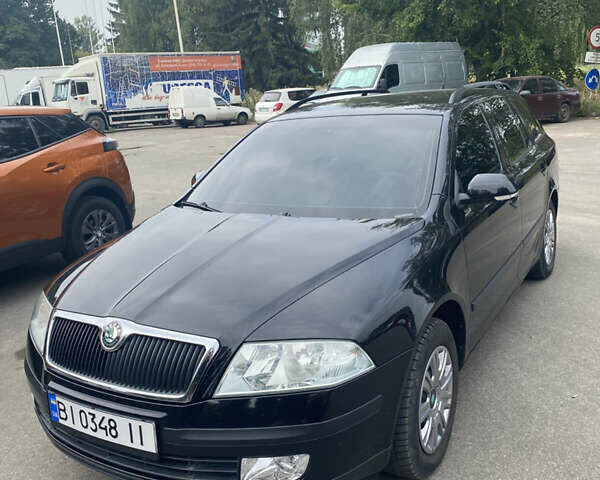 Черный Шкода Октавия, объемом двигателя 1.6 л и пробегом 211 тыс. км за 6999 $, фото 1 на Automoto.ua