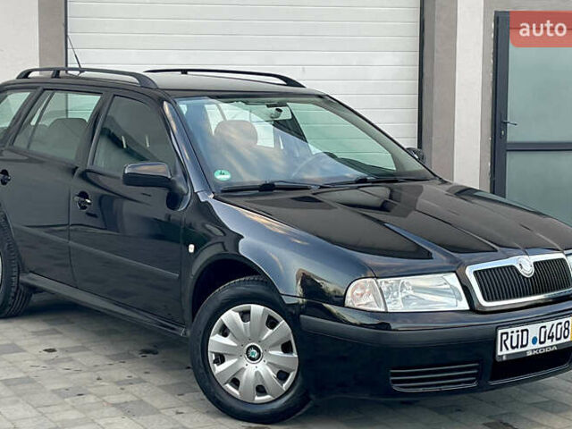 Черный Шкода Октавия, объемом двигателя 1.6 л и пробегом 169 тыс. км за 5850 $, фото 10 на Automoto.ua