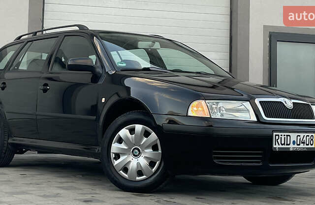 Черный Шкода Октавия, объемом двигателя 1.6 л и пробегом 169 тыс. км за 5850 $, фото 1 на Automoto.ua