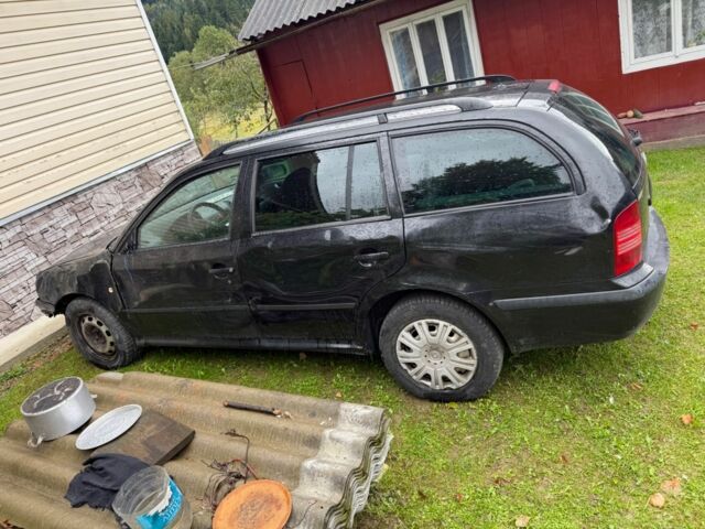 Чорний Шкода Октавія, об'ємом двигуна 2 л та пробігом 240 тис. км за 3500 $, фото 4 на Automoto.ua