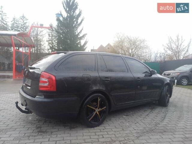 Черный Шкода Октавия, объемом двигателя 2 л и пробегом 200 тыс. км за 5500 $, фото 3 на Automoto.ua