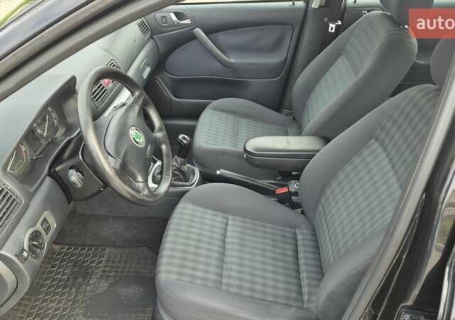 Черный Шкода Октавия, объемом двигателя 1.6 л и пробегом 217 тыс. км за 5700 $, фото 17 на Automoto.ua