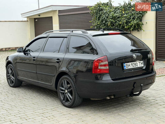 Чорний Шкода Октавія, об'ємом двигуна 2 л та пробігом 197 тис. км за 7400 $, фото 49 на Automoto.ua