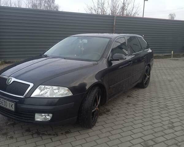 Черный Шкода Октавия, объемом двигателя 2 л и пробегом 200 тыс. км за 5500 $, фото 1 на Automoto.ua