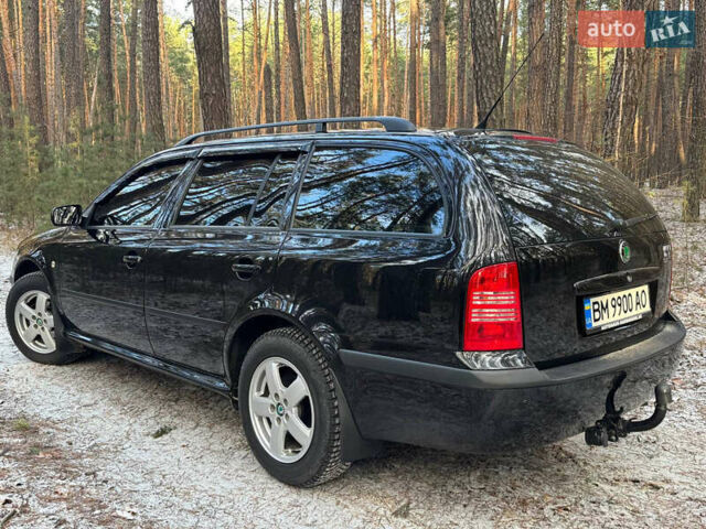 Черный Шкода Октавия, объемом двигателя 1.6 л и пробегом 210 тыс. км за 6700 $, фото 7 на Automoto.ua