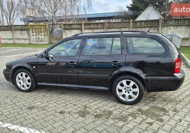 Черный Шкода Октавия, объемом двигателя 1.6 л и пробегом 217 тыс. км за 5700 $, фото 8 на Automoto.ua
